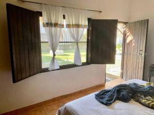 Postel nebo postele na pokoji v ubytování Casa de Campo en la Playa + 42 fotografií