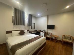 TV a/nebo společenská místnost v ubytování Anh Duc Hotel Da Lat City