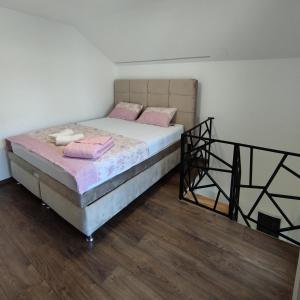Postel nebo postele na pokoji v ubytování Apartman Djune