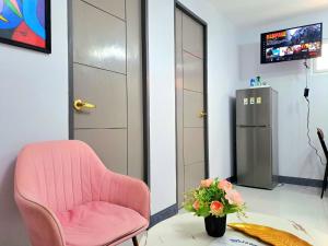TV a/nebo společenská místnost v ubytování Go-Vitug Apartell, 2-8 pax, AC, Netflix, Parking