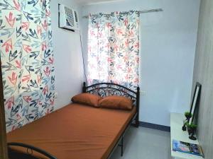 Postel nebo postele na pokoji v ubytování Go-Vitug Apartell, 2-8 pax, AC, Netflix, Parking