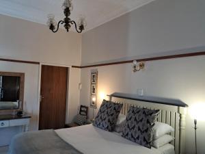 Postel nebo postele na pokoji v ubytování Jakkalsdraai Guest House + 37 fotografií