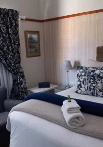 Postel nebo postele na pokoji v ubytování Jakkalsdraai Guest House