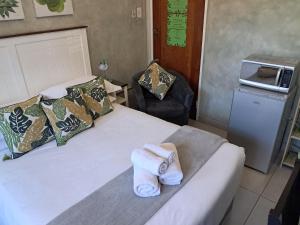 Postel nebo postele na pokoji v ubytování Jakkalsdraai Guest House
