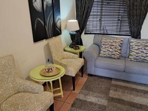 Posezení v ubytování Jakkalsdraai Guest House