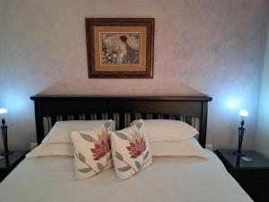 Postel nebo postele na pokoji v ubytování Jakkalsdraai Guest House