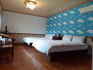 Letto o letti in una camera di Xiangcun Homestay