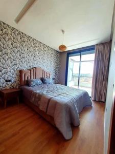 Postel nebo postele na pokoji v ubytování luxe Studio avec jacuzzi