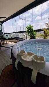 Balkón nebo terasa v ubytování luxe Studio avec jacuzzi
