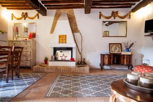 Posezení v ubytování Romantic & Charming appartamento in centro storico Cuore di Toscana