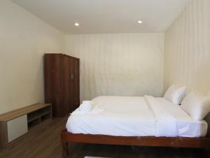Postel nebo postele na pokoji v ubytování ZAYN Samui Hotel