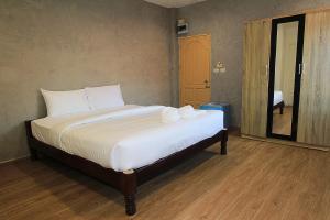 Postel nebo postele na pokoji v ubytování ZAYN Samui Hotel