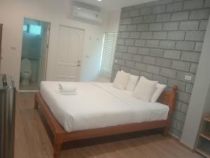 Postel nebo postele na pokoji v ubytování ZAYN Samui Hotel