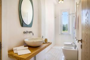 Koupelna v ubytování Casa Sole di Toscana con grande terrazza panoramica, giardino e vasca relax idromassaggio