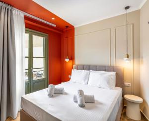 Postel nebo postele na pokoji v ubytování Atlas Boutique Suites