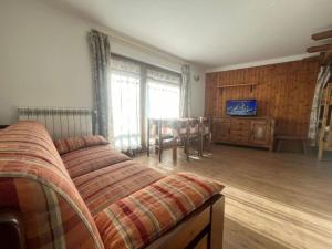 TV a/nebo společenská místnost v ubytování Casa Camos Cervinia