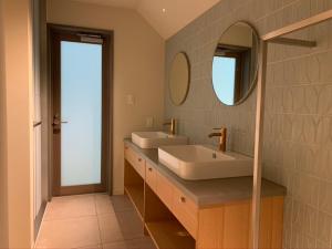 Koupelna v ubytování 淡路島ヴィラ Lazy Inn. + 27 fotografií
