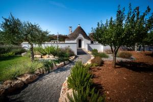 Κήπος έξω από το PALACHARME - Trulli Luxury +37 φωτογραφίες