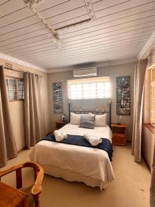 Ένα ή περισσότερα κρεβάτια σε δωμάτιο στο Farm stay at Rosemary Cottage on Haldon Estate