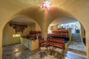 a church with a sanctuary with chairs and a table at Marhaba Royal Salem - Family Only in Sousse