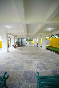 Fotografie z fotogalerie ubytování Yellow Bells Studios And Suites v destinaci Gachibowli