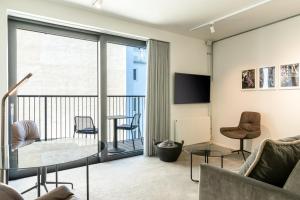 TV a/nebo společenská místnost v ubytování Boutique Hotel Herman K