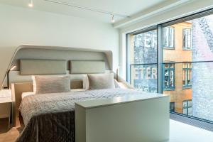 Postel nebo postele na pokoji v ubytování Boutique Hotel Herman K