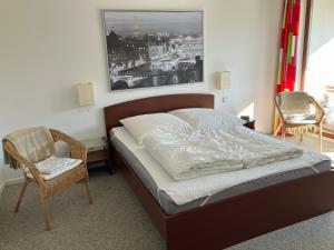 Postel nebo postele na pokoji v ubytování An den Isarauen