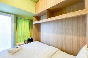 Imagen de la galería de Fully Furnished with Cozy Design Studio Apartment Tokyo Riverside PIK 2 By Travelio, en Rawalembang