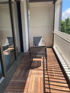 Balkón nebo terasa v ubytování F2 neuf cosy et élégant avec terrasse, parking, WIFI