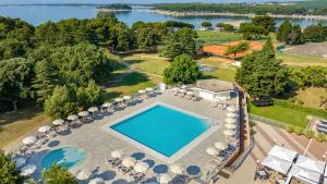 an aerial view of a resort with a swimming pool at Arena Hotel Holiday in Medulin
