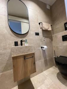 Koupelna v ubytování Sea Sage Suites