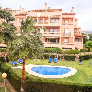 The swimming pool at or close to Spacious and stylish penthouse in Mijas