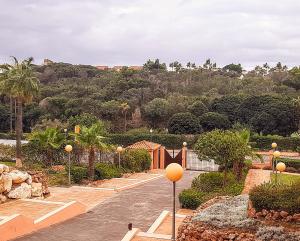 A garden outside Spacious and stylish penthouse in Mijas