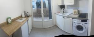 Η κουζίνα ή μικρή κουζίνα στο Appartement- Studio avec terrasse