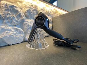 a hair brush sitting on top of a counter at RetreIto Resort in Ito