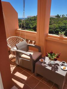 A seating area at Spacious and stylish penthouse in Mijas