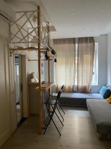 a room with a bunk bed and a bed at LEO Apartment in Belgrade