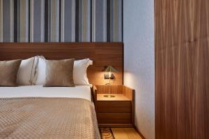 Voodi või voodid majutusasutuse VALIS LUXURY Hotel toas