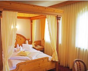 Postel nebo postele na pokoji v ubytování Hotel Bergland