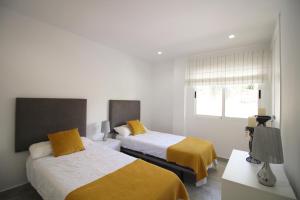 Ένα ή περισσότερα κρεβάτια σε δωμάτιο στο Beautiful Three Bedrooms Los Olivos Penthouse