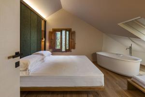 Ένα ή περισσότερα κρεβάτια σε δωμάτιο στο Gebel House