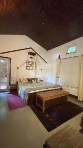 Postel nebo postele na pokoji v ubytování Rustic Home by Farms & Jungle - Entire Cottage