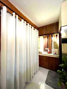 Fotografie z fotogalerie ubytování Cozy Bungalow Dua with AC and Generator in General Luna v destinaci General Luna