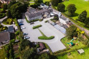 an aerial view of a house with a large driveway at The Kellbank in Gosforth