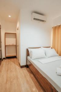 Postel nebo postele na pokoji v ubytování Sonora's Inn, Coron + 12 fotografií