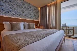 Voodi või voodid majutusasutuse VALIS LUXURY Hotel toas