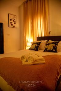 Ένα ή περισσότερα κρεβάτια σε δωμάτιο στο Beautiful Apartment in Jabi