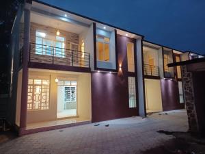 a large house with a lot of windows on it at Zeimet Appartment 2 in Rohero
