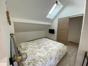 Postel nebo postele na pokoji v ubytování T2 Chez Mongery